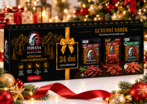 Indiana Jerky Advent Calendar, long black box with gold bow and Indiana jerky packs, in front of a lit Christmas tree