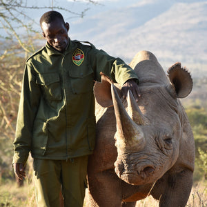 Black rhino Alfie with his keeper Peter at Ol Jogi, Kenya – Save the Rhino International