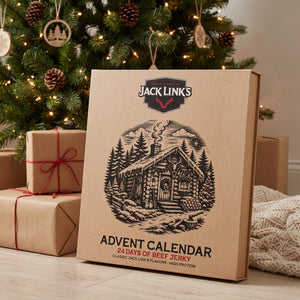 Jack Link's Advent Calendar leaning against kraft-wrapped gifts under a Christmas tree