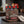 Beef & Beyond Box with Jack Link's and Renjer on a dark wooden cutting board on a kitchen counter in soft window light, AI-generated image