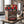 Beef & Beyond Box with Jack Link's and Renjer on a gym bench, with dumbbells, a towel and a water bottle in the background, AI-generated image