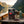 Meat Makers Beef Original Hot on the deck of a small boat on a fjord, with a rope and thermos in the evening sun, AI-generated image