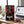 BeJerky Wagyu Jerky Original on a desk next to a laptop, a cup of coffee and a notebook, AI-generated image