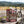 Big Brand Originals Beef Jerky Mixed Pack on a bench by a gravel road, with a bike and a cycling helmet, AI-generated image