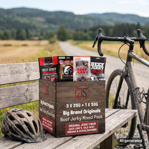 Big Brand Originals Beef Jerky Mixed Pack on a bench by a gravel road, with a bike and a cycling helmet, AI-generated image