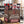 Big Brand Originals Beef Jerky Mixed Pack on a gym bench, with dumbbells, a towel and a water bottle in the background, AI-generated image