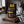 Biltong Premium Biltong Original on a dark wooden cutting board on a kitchen counter in soft window light, AI-generated image
