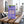 Cherky Beef Bar Beetroot & Cranberries on a gym bench, with dumbbells, a towel and a water bottle in the background, AI-generated image