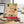 Cherky Beef Jerky Original on a desk next to a laptop, a cup of coffee and a notebook, AI-generated image