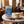 Chokay BIO Bar Amazing Milk on a marble cafe table next to a cappuccino, AI-generated image