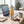 Chokay Bio Snackbar Caramel Peanut on a desk next to a laptop, a cup of coffee and a notebook, AI-generated image