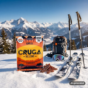 Cruga Biltong Chilli in the snow next to touring skis and poles on a sunny winter day in the Alps, AI-generated image