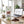 Fine Gusto Beef Jerky Pepper on a desk next to a laptop, a cup of coffee and a notebook, AI-generated image
