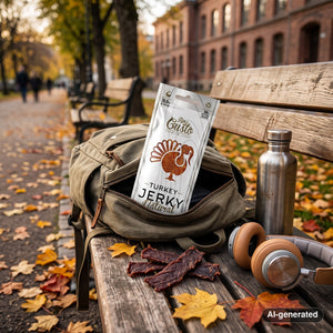 Fine Gusto Turkey Jerky Natural sticking out of a backpack on a park bench in autumn, with a water bottle and headphones, AI-generated image