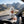 Fine Gusto Turkey Jerky Natural on the dashboard of a car at a mountain pass viewpoint, AI-generated image