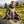 Hiker taking a break on an alpine meadow holding Franky's Best Beef Jerky Carolina Reaper, AI-generated image