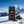 Franky's Best Beef Jerky Chili in the snow next to touring skis and poles on a sunny winter day in the Alps, AI-generated image