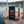 Franky's Best Beef Jerky Chili on the deck of a small sailboat on a lake in the evening sun, with a rope and thermos, AI-generated image