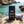 Franky's Best Beef Jerky Classic on a rock by a Mediterranean cove, with a towel and sunglasses, AI-generated image