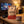 Grizzly Foods Biltong Red Heat on a coffee table in the evening, with a game controller and a small bowl, AI-generated image