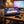 Happy Birthday Box on a coffee table in the evening, with a game controller and a small bowl, AI-generated image