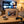 Indiana Cut Your Own Biltong Box on a coffee table in the evening, with a game controller and a small bowl, AI-generated image