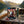 Indiana Jerky Beef Less Salt on the deck of a small boat on a fjord, with a rope and thermos in the evening sun, AI-generated image