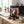 Indiana Jerky Beef Less Salt on a desk next to a laptop, a cup of coffee and a notebook, AI-generated image