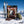 Indiana Jerky Beef Peppered in the snow next to touring skis and poles on a sunny winter day in the mountains, AI-generated image