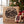 Jack Link's Beef Jerky Advent Calendar next to wrapped presents under the Christmas tree, AI-generated image
