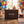 Jack Link's Gift Box on a table at a birthday party with balloons and confetti, AI-generated image