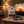 KJØ Goddamn Spicy Beef Jerky on a coffee table in the evening, with a game controller and a small bowl, AI-generated image