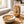 KoRo Apple Chips Elstar on a breakfast table next to a bowl of yogurt and granola, AI-generated image
