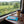 Mr. Beast Feastables Milk Crunch on a train table by the window, with a coffee cup, AI-generated image