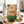 Grizzly Foods Biltong Wild Rosemary 30g pack on a gym bench with a 5kg dumbbell, towel and water bottle