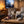 Renjer Elk Jerky Sea Salt on a coffee table in the evening, with a game controller and a small bowl, AI-generated image