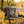 Renjer Elk Jerky Sea Salt sticking out of a backpack on a park bench in autumn, with a water bottle and headphones, AI-generated image