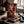 Renjer Red Deer Jerky Chili & Lime on a dark wooden cutting board on a kitchen counter in soft window light, AI-generated image