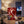 Renjer Red Deer Jerky Chili & Lime on a coffee table in the evening, with a game controller and a small bowl, AI-generated image