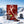 Renjer Red Deer Jerky Chili & Lime in the snow next to touring skis and poles on a sunny winter day in the mountains, AI-generated image