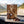 Renjer Red Deer Jerky Sea Salt on the dashboard of a car at a mountain pass viewpoint, AI-generated image