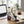 Renjer Reindeer Jerky Sea Salt on a desk next to a laptop, a cup of coffee and a notebook, AI-generated image