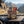 Renjer Tasting 5-pack on the dashboard of a car at a mountain pass viewpoint, AI-generated image
