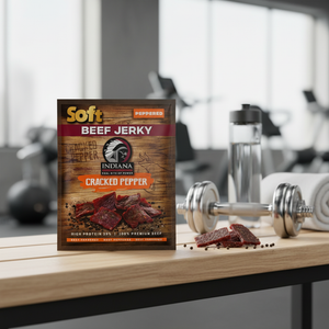 Indiana Soft Beef Jerky Peppered 20g pack in a gym as a high-protein post-workout snack
