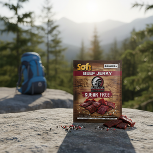Indiana Soft Beef Jerky Original 20g pack on a mountain hiking trail