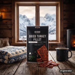 Meat Makers Turkey Dried Fillet on a wooden table in a mountain cabin, with a wool blanket, an enamel mug and snowy mountains outside, AI-generated image